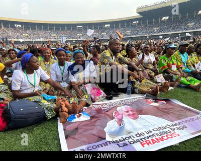 02 February 2023, Democratic Republic of the Congo, Kinshasa: Numerous believers are waiting in the soccer stadium 'Martyrs Stadium' for the arrival of Pope Francis. The pope is visiting Congo this week and will travel on to South Sudan on Feb. 3, 2023. Photo: Manuel Schwarz/dpa Stock Photo