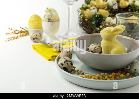 Festive Easter table setting with beautiful floral decor Stock Photo