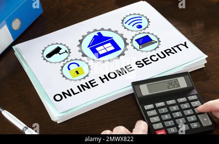 Online home security concept illustrated on a paper with a calculator Stock Photo
