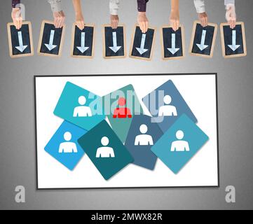 Hands holding writing slates with arrows pointing on leadership concept Stock Photo