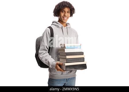 Smiling male african american student with a backpack holding  a pile of books isolated on white background Stock Photo