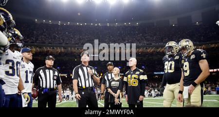Danny Abramowicz (46), wide receiver for the original, inaugural 1967 New  Orleans Saints, holds his hand to his heart with New Orleans Saints wide  receiver Willie Snead (83), during the National Anthem