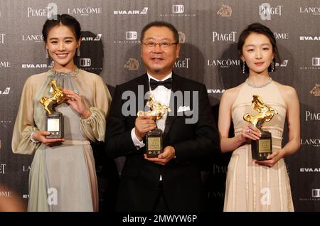 Chinese actress Zhou Dongyu and actor Luo Jin attend a press