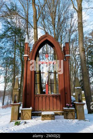 The unique forest wooden pseudo-Gothic Chapel of the Holy Cross from 1835 is one of the romantic jewels of the vast English park of Chateau. Stock Photo