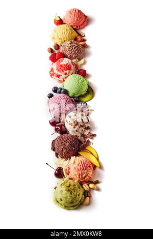 Top view of various delicious gelato balls with fresh fruit slices and berries with pistachios Stock Photo