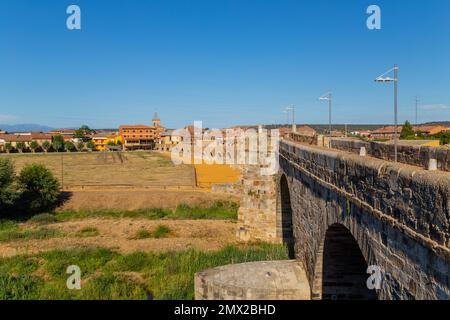 Hospital de Orbigo, Spain - August 18, 2022 - Some pilgrims walking along the way of St.James, in Hospital de Orbigo Stock Photo