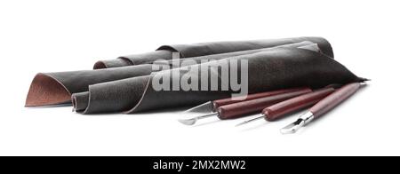 Leather samples and craftsman tools isolated on white Stock Photo
