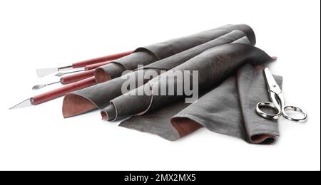 Leather samples and craftsman tools isolated on white Stock Photo