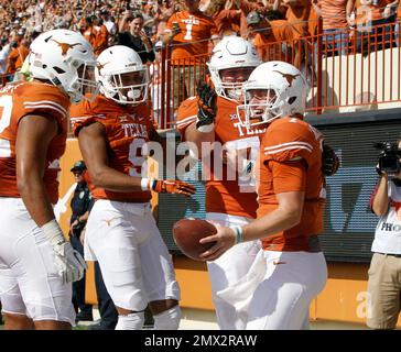 Texas quarterback Shane Buechele, right, runs the ball against Maryland  defensive back JC Jackson, left, during the second half of an NCAA college  football game, Sept. 2, 2017 in Austin, Texas. Maryland