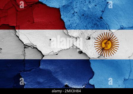 Flags of Netherlands and Argentina painted on cracked wall Stock Photo ...