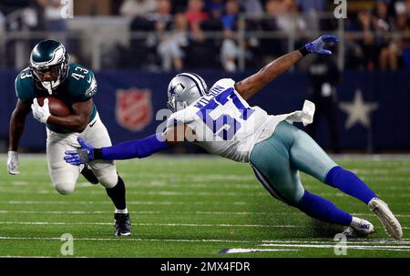 Dallas Cowboys vs. Washington Redskins. NFL Game. American Football League  match. Silhouette of professional player celebrate touch down. Screen in ba  Stock Photo - Alamy