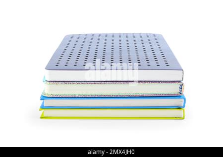 Stack of different notepads isolated on white Stock Photo