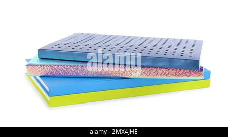 Stack of different notepads isolated on white Stock Photo