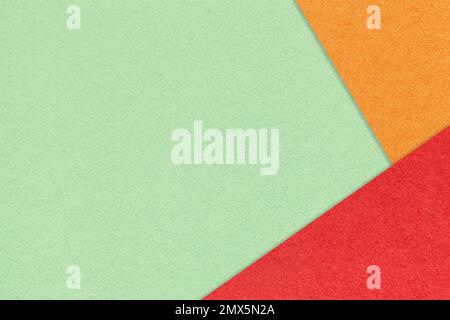 Texture of craft light green color paper background with red and orange border. Vintage abstract olive cardboard. Presentation template and mockup wit Stock Photo
