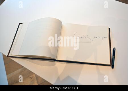 The visitors' book signed by The Queen Consort at the 50th anniversary celebrations of children's reading charity Coram Beanstalk in London. Picture date: Thursday February 2, 2023. Stock Photo