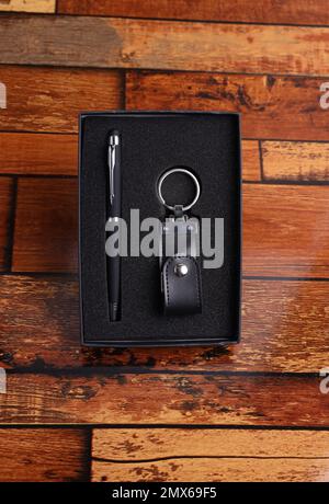 corporate gift box open top view on the wooden table Stock Photo