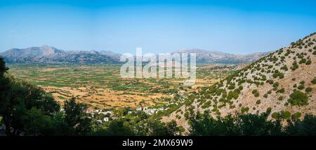 Panoramic view of Lasithi Plateau from Cave of Diktaion Andron. Amazing aerial view of famous Lasithi Plateau in Crete, Greece Stock Photo