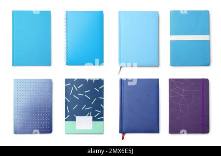 Set of different notebooks on white background, top view Stock Photo