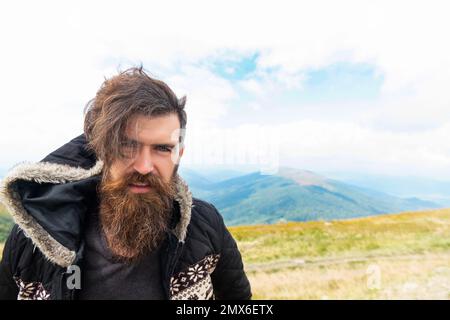 bearded man outdoor, advertisement. bearded man has beard. bearded man having moustache Stock Photo