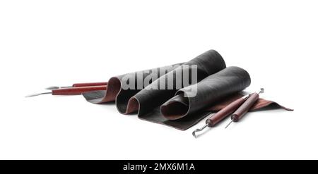 Leather samples and craftsman tools isolated on white Stock Photo