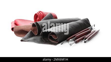 Leather samples and craftsman tools isolated on white Stock Photo