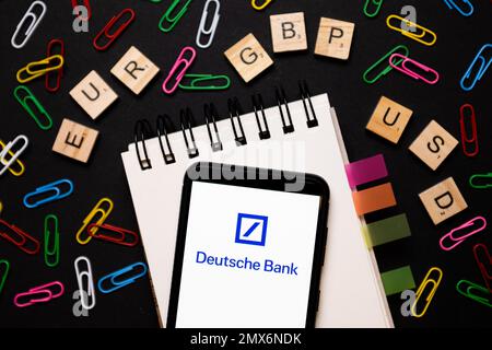 In this photo illustration a Deutsche Bank logo seen displayed on a smartphone. Stock Photo