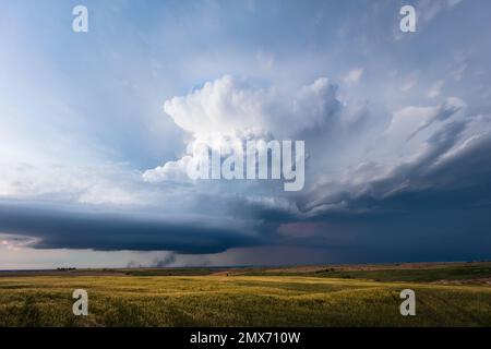 Dramatic stormy sky with a supercell thunderstorm over a field near McCook, Nebraska Stock Photo