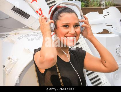 London, UK. 02nd Feb, 2023. Fresh from her recent UK No.1 single, singer Raye (RAYE), short for Rachel Agatha Keen, smiles and poses with an installation of her latest album cover at Kings Cross station, to coincide with the release of the new album, 'My 21st Century Blues'. Copyright: Imageplotter/Alamy Live News Stock Photo