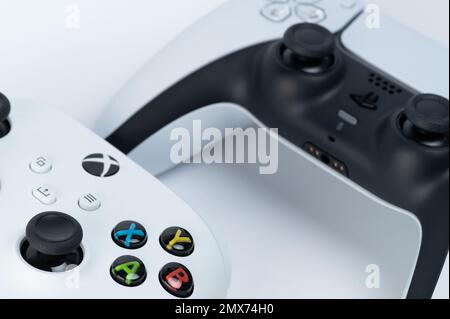 New york, USA - December 28, 2022: Buttons on xbox game controller in sony playstation 5 background Stock Photo