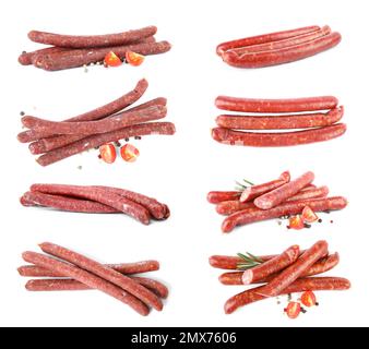 Set with tasty smoked sausages on white background Stock Photo