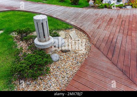 Decking path in the garden. Stock Photo