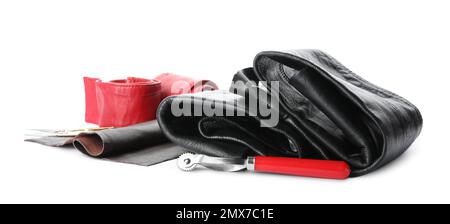 Leather samples and craftsman tools isolated on white Stock Photo