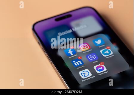 New york, USA - January 28, 2022: Chat networking apps on iphone 14 pro in smartphone screen close up view Stock Photo