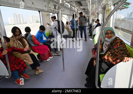 Dhaka, Bangladesh, on February 2, 2023 Passengers travel inside the Metro train from Uttara North to Agargaon in Dhaka, Bangladesh, on February 2, 2023 Stock Photo