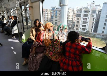 Dhaka, Bangladesh, on February 2, 2023 Passengers travel inside the Metro train from Uttara North to Agargaon in Dhaka, Bangladesh, on February 2, 2023 Stock Photo