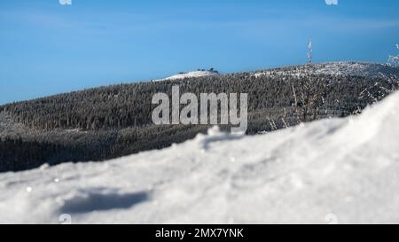 Winter scenery with amazing view to the highest mountain in Czech Republic called Snow mountain. Fantasy atmosphere with clear sky on Bohemia mountain Stock Photo