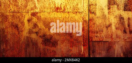 Panoramic grunge rusted metal texture. Rusty corrosion and oxidized plate. Worn metallic iron background. Stock Photo