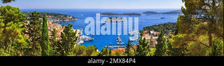 Coastal summer - top view of the City Harbour of the town of Hvar and Paklinski Islands, the island of Hvar, the Adriatic coast of Croatia Stock Photo