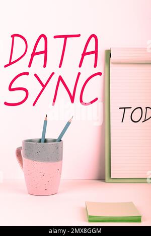 Text caption presenting Data Sync. Word for data that is continuously generated by different sources Stock Photo
