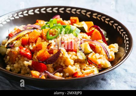 Moroccan Couscous with Roasted Vegetables and Chickpeas Stock Photo