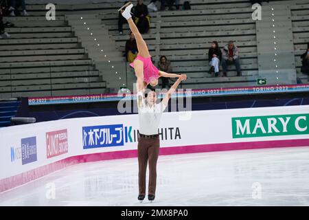 Haruna Murakami and Sumitada Moriguchi (JPN) perform during the Junior Pairs - Free Skating of the ISU Grand Prix of Figure Skating Final Turin at Palavela Stock Photo