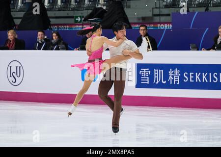 Haruna Murakami and Sumitada Moriguchi (JPN) perform during the Junior Pairs - Free Skating of the ISU Grand Prix of Figure Skating Final Turin at Palavela Stock Photo