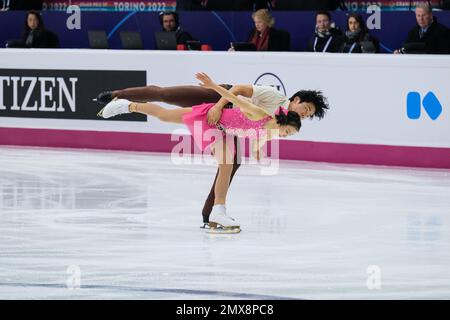 Haruna Murakami and Sumitada Moriguchi (JPN) perform during the Junior Pairs - Free Skating of the ISU Grand Prix of Figure Skating Final Turin at Palavela Stock Photo