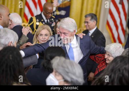 Washington, United States. 02nd Feb, 2023. Former President Bill Clinton greets guests after an event celebrating the 30th anniversary of the Family and Medical Leave Act (FMLA) in the East Room of the White House in Washington, DC on Thursday, Feb. 2, 2023. The FMLA, the first piece of legislation Clinton signed into law, allows workers to take up to 12 weeks of job protected, unpaid leave for specific family and medical reasons. Photo by Bonnie Cash/UPI Credit: UPI/Alamy Live News Stock Photo