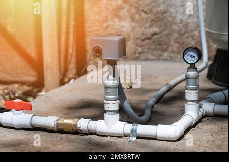 High pressure water pump pipe connection plumbing close up view Stock Photo