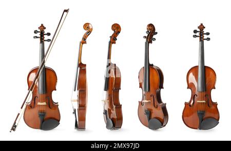 Set of classic violins on white background Stock Photo