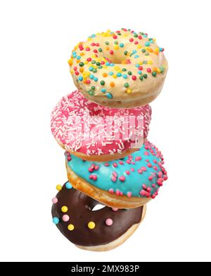 Set of falling delicious donuts on white background Stock Photo