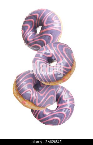 Set of falling delicious donuts on white background Stock Photo