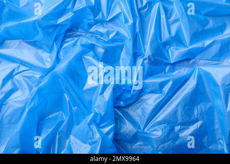 Crumpled blue polyethylene as background Stock Photo