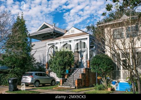 NEW ORLEANS, LA, USA - JANUARY 27, 2023: Front of three houses on the 8000 block of representing the early 20th century to the 21st century Stock Photo